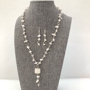 White hand made necklace and earrings